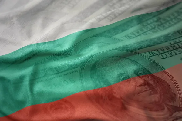 Renkli bir Amerikan Doları para arka plan Bulgaristan Ulusal bayrağını sallıyor. Ekonomi kavramı — Stok fotoğraf