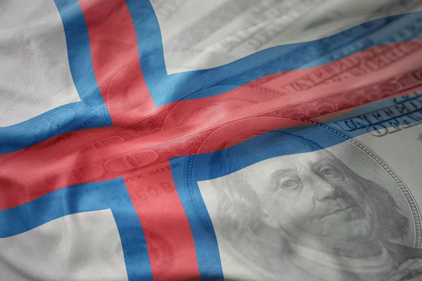 Colorful waving national flag of faroe islands on a american dollar money background. finance concept — Stock Photo, Image
