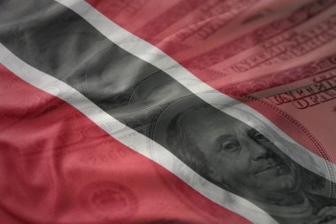 trinidad ve tobago Amerikan Doları para arka plan üzerinde bayrağı sallayarak renkli. Ekonomi kavramı