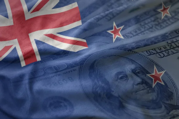 Colorful waving national flag of new zealand on a american dollar money background. finance concept — Stock Photo, Image