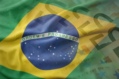 renkli bir euro para banknot arka plan Brezilya Ulusal bayrağını sallıyor. Ekonomi kavramı