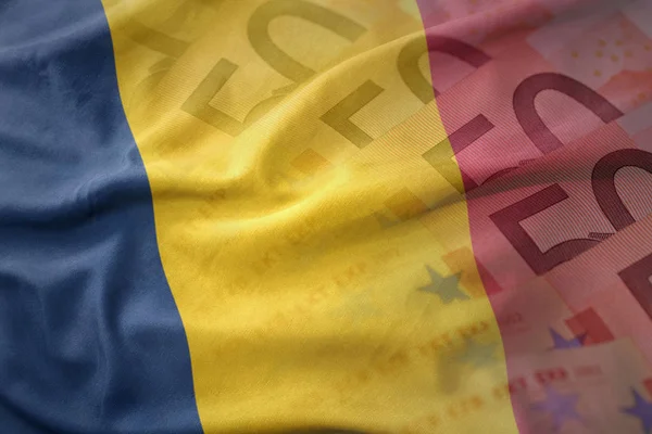 Färgglada viftande flagga Tchad på euron pengar sedlar bakgrund. Finance koncept — Stockfoto