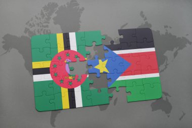 Dominika ve bir dünya haritası üzerinde Güney sudan bayrağı ile bulmaca