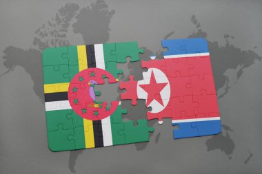 Dominika ve Kuzey Kore ulusal bayrak bir dünya haritası üzerinde ile bulmaca