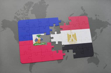 haiti ve Mısır ulusal bayrak bir dünya haritası üzerinde ile bulmaca