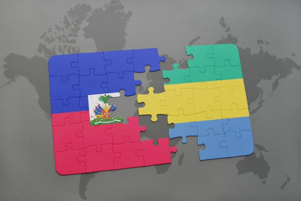 A nemzeti zászló, a haiti és gabon a világtérképen puzzle — Stock Fotó
