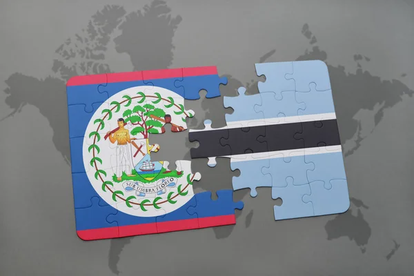 Puzzle con la bandiera nazionale di belize e botswana su una mappa del mondo — Foto Stock