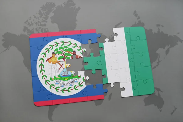 Головоломка з національним прапором Белізу і Нігерії на карті світу — стокове фото