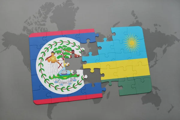 Puzzel met de nationale vlag van belize en rwanda op een wereldkaart — Stockfoto