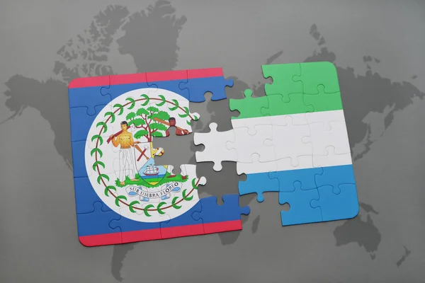 Puzzel met de nationale vlag van belize en sierra leone op een wereldkaart — Stockfoto