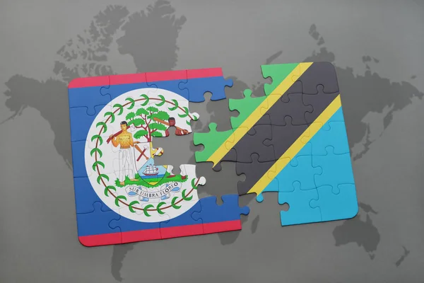 Puzzel met de nationale vlag van belize en tanzania op een wereldkaart — Stockfoto