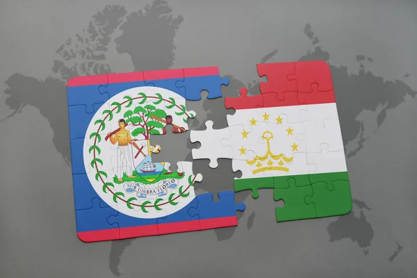 Puzzle con la bandiera nazionale di belize e tajikistan su una mappa del mondo — Foto Stock
