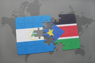 Nikaragua ve onun bir dünya haritası üzerinde Güney sudan bayrağı ile bulmaca