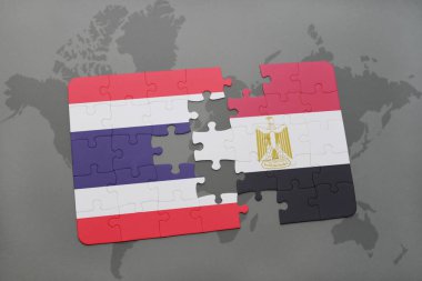 Tayland ve Mısır ulusal bayrak bir dünya haritası üzerinde ile bulmaca