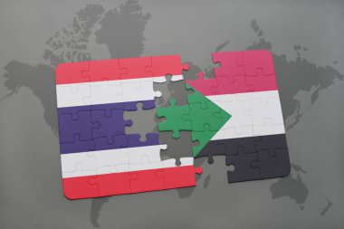 bir dünya haritası üzerinde Tayland ve sudan bayrağı ulusal ile bulmaca