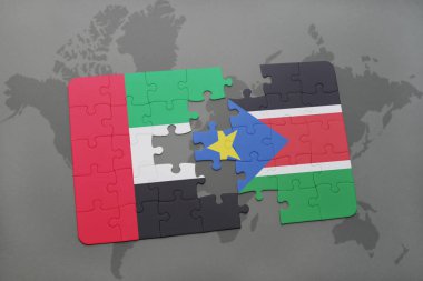 Birleşik Arap Emirlikleri ve Güney sudan bir dünya haritası üzerinde bayrağı ile bulmaca