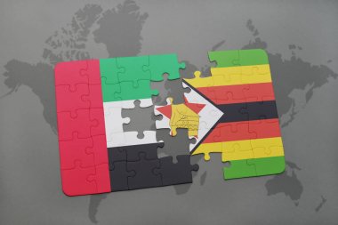 Birleşik Arap Emirlikleri ve Zimbabve Ulusal bayrak bir dünya haritası üzerinde ile bulmaca
