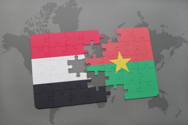 yemen ve burkina faso ulusal bayrak bir dünya haritası üzerinde ile bulmaca
