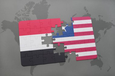 yemen ve Liberya ulusal bayrak bir dünya haritası üzerinde ile bulmaca