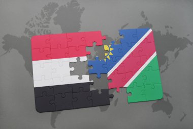yemen ve Namibya ulusal bayrak bir dünya haritası üzerinde ile bulmaca