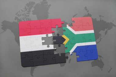 yemen ve Güney Afrika ulusal bayrak bir dünya haritası üzerinde ile bulmaca