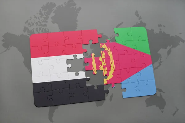 Rompecabezas con la bandera nacional de yemen y eritrea en un mapa del mundo — Foto de Stock