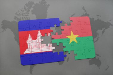 Kamboçya ve burkina faso ulusal bayrak bir dünya haritası üzerinde ile bulmaca