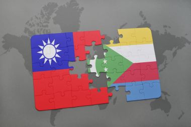 Tayvan ve Komor Adaları ulusal bayrak bir dünya haritası üzerinde ile bulmaca
