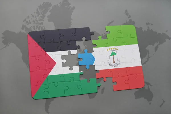 세계 지도에 적도 기니와 팔레스타인의 국기와 함께 퍼즐 — 스톡 사진