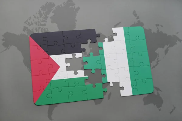 Puzzel met de nationale vlag van Palestina en nigeria op een wereldkaart — Stockfoto