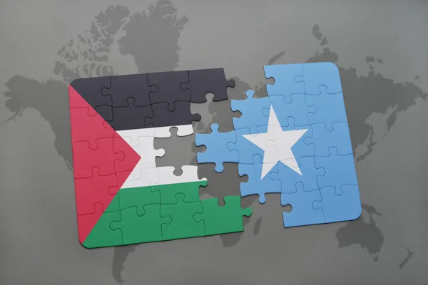 Rompecabezas con la bandera nacional de Palestina y Somalia en un mapa del mundo —  Fotos de Stock