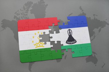 bir dünya haritası üzerinde Tacikistan ve Lesoto bayrağı ulusal ile bulmaca