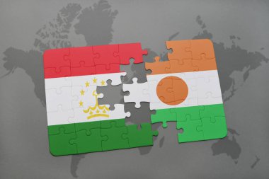 Tacikistan ve Nijer bir dünya haritası üzerinde bayrağı ile bulmaca