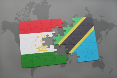 Tanzanya ve Tacikistan Ulusal bayrak bir dünya haritası üzerinde ile bulmaca