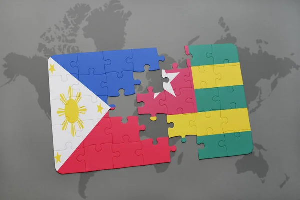 フィリピン、トーゴの国旗は世界地図のパズルします。 — ストック写真