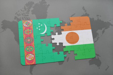 Türkmenistan ve Nijer bir dünya haritası üzerinde bayrağı ile bulmaca