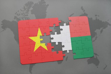 vietnam ve Madagaskar ulusal bayrak bir dünya haritası üzerinde ile bulmaca