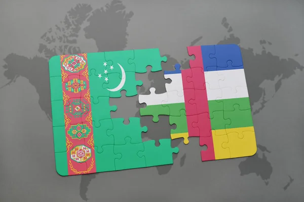 Puzzle con la bandiera nazionale del turkmenistan e della Repubblica Centrafricana su una mappa del mondo — Foto Stock