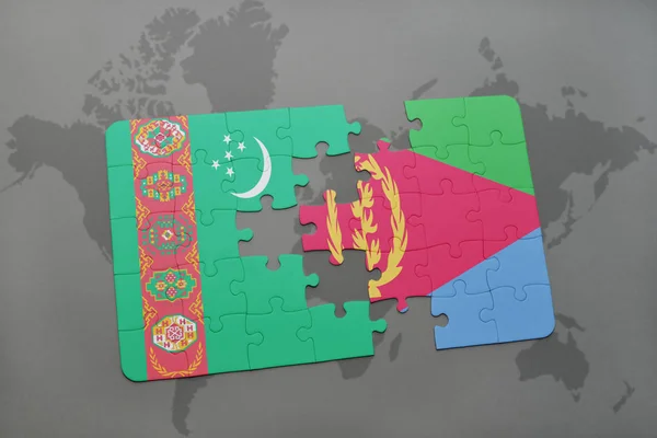 Puzzel met de nationale vlag van turkmenistan en eritrea op een wereldkaart — Stockfoto