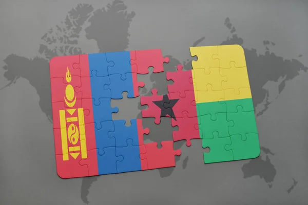 Puzzle a nemzeti zászló, Mongólia és a guinea bissau-ra egy világ Térkép — Stock Fotó