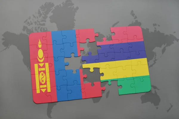 Puzzel met de nationale vlag van Mongolië en mauritius op een wereldkaart — Stockfoto