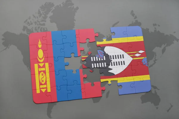 Rompecabezas con la bandera nacional de Mongolia y Swazilandia en un mapa del mundo — Foto de Stock