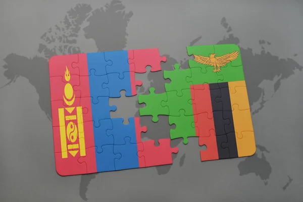 Puzzel met de nationale vlag van Mongolië en zambia op een wereldkaart — Stockfoto