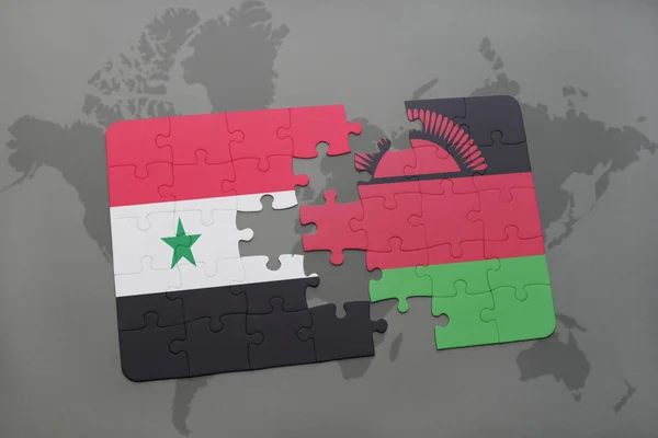 Puzzel met de nationale vlag van Syrië en malawi op een wereldkaart — Stockfoto