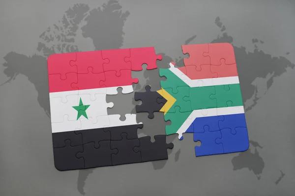 Головоломка з Національний прапор Сирії та Південної Африки на мапі світу — стокове фото