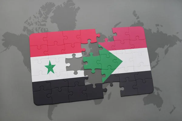 Головоломка з Національний прапор Сирії та Судан на карті світу — стокове фото