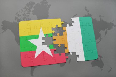 myanmar bayrağı ile bulmaca ve Fildişi Sahili bir dünya haritası üzerinde