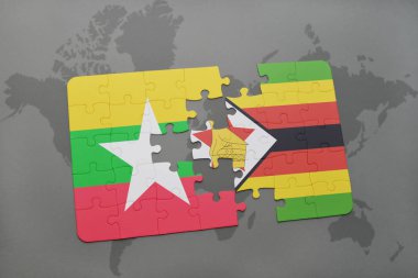 myanmar ve Zimbabve Ulusal bayrak bir dünya haritası üzerinde ile bulmaca
