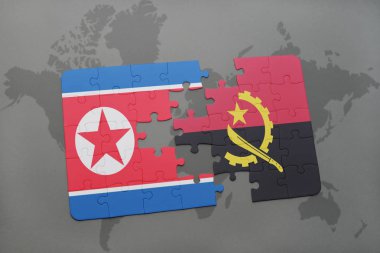 Kuzey Kore ve angola ulusal bayrak bir dünya haritası üzerinde ile bulmaca
