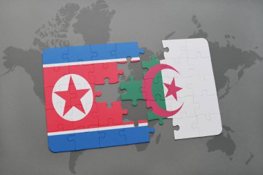 Kuzey Kore ve Cezayir ulusal bayrak bir dünya haritası üzerinde ile bulmaca